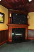 Warming up by the corner fireplace