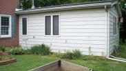 Backyard view of the old family room addition