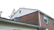 Old addition, poorly flashed and overloading gutters