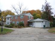 View of newly remodeled home from driveway