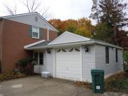 New siding and flashing on exterior of garage