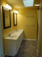 New upstairs bathroom design by Drumm Design Remodel