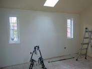 Priming for new paint in new bedroom addition