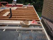 Leveling sub flooring for a stable new addition