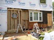 Repaired wall section to make addition stable