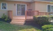 A side set of steps lead to the other sliding door