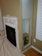 New cabinets are trimmed out and design template is drawn out on the walls