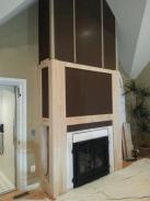 Base trim around cabinets and fireplace