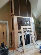 Preparing to hang trim on upper section of fireplace