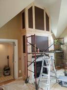Finished trim going up on upper section of fireplace