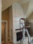 Drumm Design Remodel priming the trim work for paint