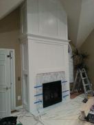 Fireplace trim painted and Drumm Design Remodel adding marble fireplace surround