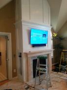 Big screen TV mounted and mantel ready for primer and paint