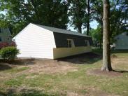 After Drumm Design Remodel removed the old garage and rebuilt this new three car garage in its place