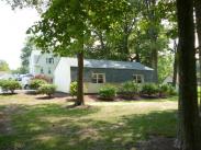 The new garage by Drumm Design Remodel with landscaping