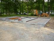 Gravel and rebar being laid prior to pouring the concrete floor
