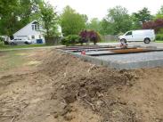 Drumm Design Remodel laying the foundation for the new garage