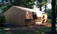 View from back of garage Gambrell roof designed by Drumm Design Remodel