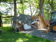 The walls and roof coming down
