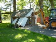 We were able to utilize a backhoe to teardown this garage