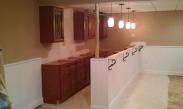 Drumm Design Remodel installing new cabinets