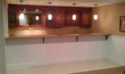 New cabinets and mirror give the bar more atmosphere