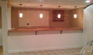 Bar demoltion, removing old cabinets, counters and tile