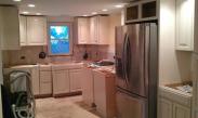New cabinets being installed by Drumm Design Remodel