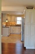The space in this kitchen is used to it's maximum in this creative design by Drumm Design Remodel