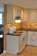 Plenty of light under the new cabinets and range hood