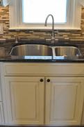 This terrific double bowl stainless steel sink provides plenty of clean up space for a busy and growing family