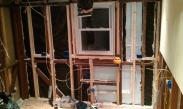 New framing and packing of kitchen to make sure walls were straight and plumb for cabinets