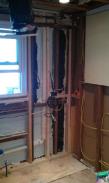 This kitchen required tearing out the dry wall and fixing a multitude of structural issues