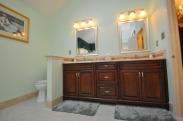 Terrific triple lights above the sinks provide plenty of light for the homeowners