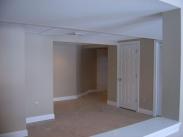 Drumm Design Remodel built storage areas to keep clutter contained in this basement