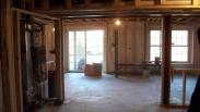 Framing of basement, the view out to the sliding glass door and window