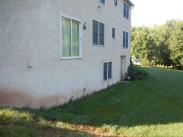 This Lansdale home with a walk out basement was badly in need of a deck for the sliding glass door to nowhere