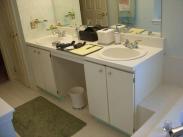 The old, dated double vanity, these cabinets were in need of a change for sure