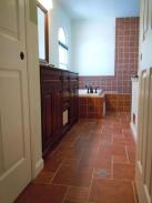 Check out the decorative tile work in this bathroom remodel by Drumm Design Remodel