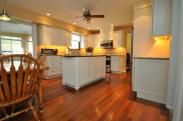 A view from the floor, notice the center island is trimmed out to look like a freestanding piece of furniture