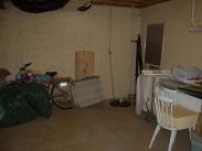 A typical basement before Drumm Design Remodel, dark and cluttered