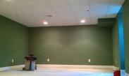 Can lights in drop ceiling and there are cutouts around the sprinkler heads