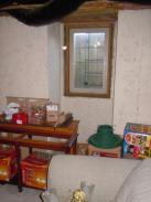 The existing egress window before Drumm Design Remodel