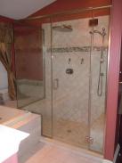 The new frameless shower surround installed by Drumm Design Remodel