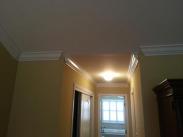 New crown moulding by Drumm Design Remodel going up in the home