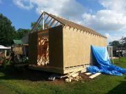 Drumm Design Remodel framing up the new shed sides and the beginnings of the roof