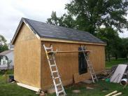 Tar paper on the roof and getting ready for shingles