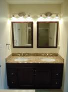 The new vanity with dual sinks, mirrors and light bars 