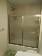 Drumm Design Remodel made this bath and shower water tight again and updated its style at the same time