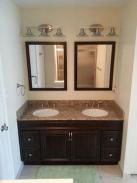 The lovely new vanity features twin undermounted sinks